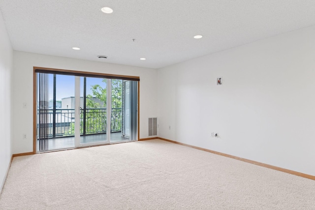2231 Penn Pl Unit 224, North Saint Paul, MN 55109 - unfurnished room featuring light carpet, baseboards, and recessed lighting