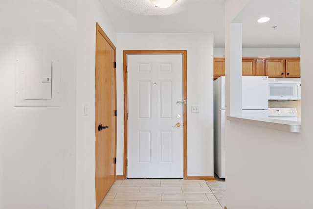 2231 Penn Pl Unit 224, North Saint Paul, MN 55109 - entryway with baseboards and electric panel