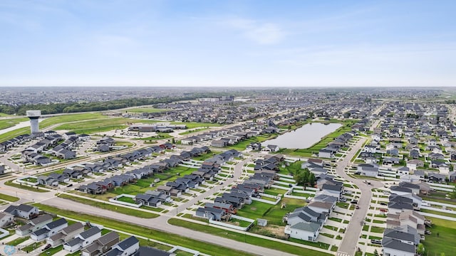 2128 Admiral Dr W, West Fargo, ND 58078 - aerial view of property and surrounding area with nearby suburban area and a large body of water