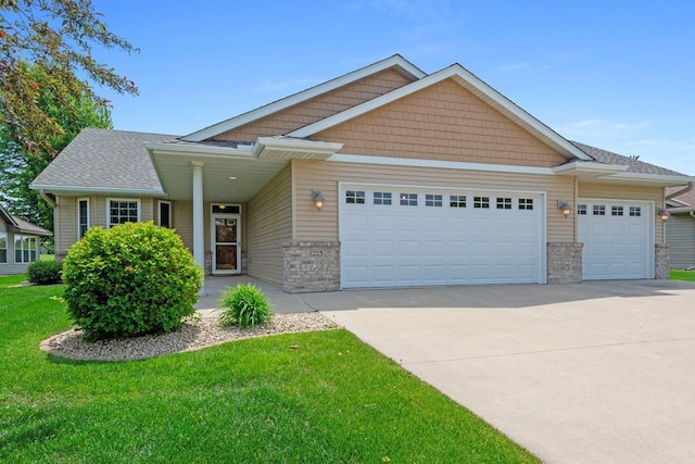 1223 Cypress Dr W, Annandale, MN 55302 - craftsman-style home featuring a garage, concrete driveway, a front yard, and brick siding
