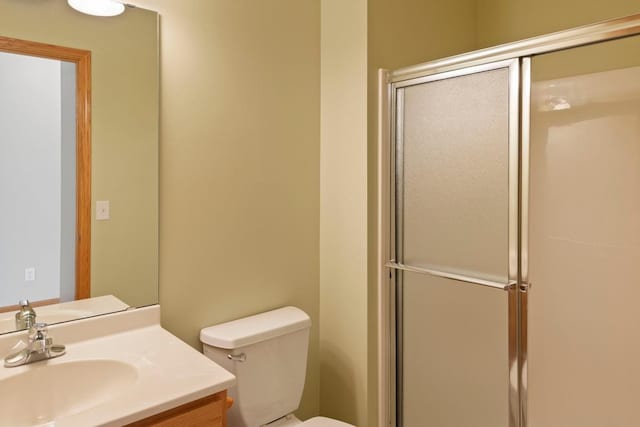1223 Cypress Dr W, Annandale, MN 55302 - bathroom featuring vanity, a stall shower, and toilet