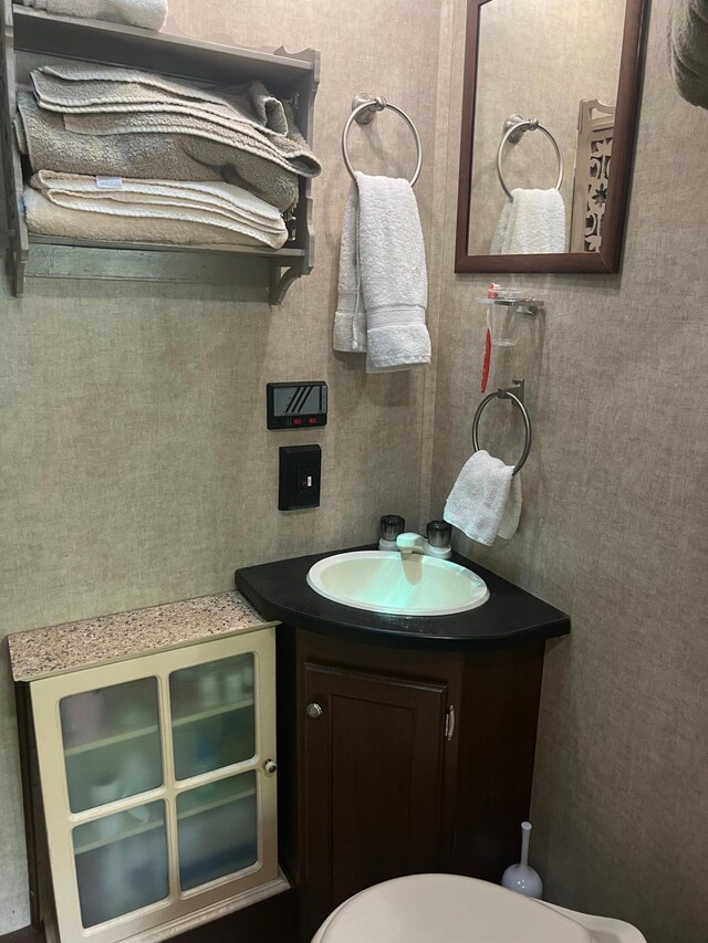 13240 Devils Lake Rd NW Unit 27And 26, Brandon Twp, MN 56315 - bathroom featuring vanity and toilet