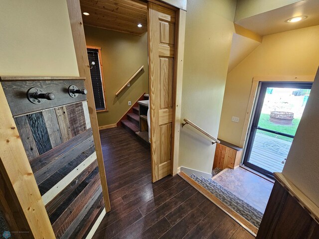 609 1st St N, Wahpeton, ND 58075 - hall with dark wood finished floors, stairs, recessed lighting, and baseboards
