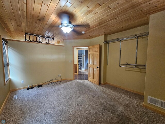 609 1st St N, Wahpeton, ND 58075 - unfurnished bedroom with carpet flooring, wood ceiling, and baseboards