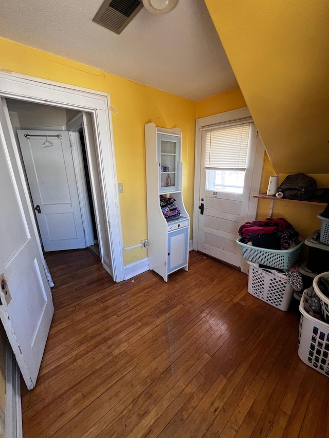 722 2nd St SW, Willmar, MN 56201 - additional living space featuring hardwood / wood-style floors and baseboards