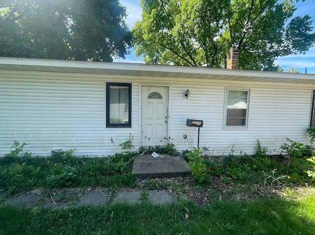 5336 44th Ave S, Minneapolis, MN 55417 - doorway to property with a chimney