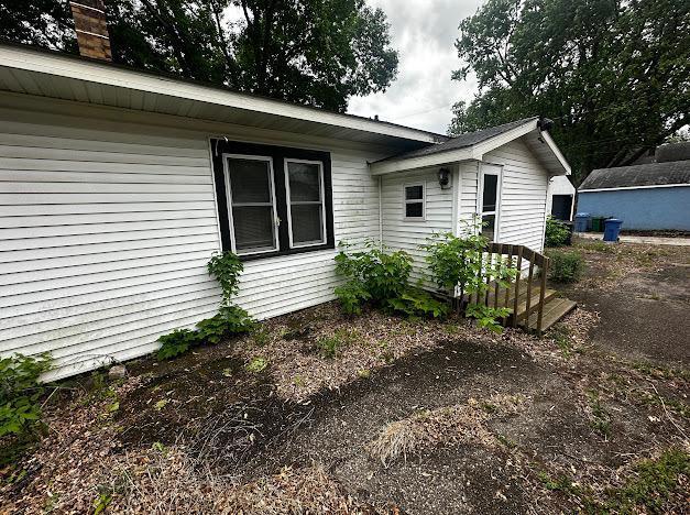 5336 44th Ave S, Minneapolis, MN 55417 - view of property exterior with a chimney