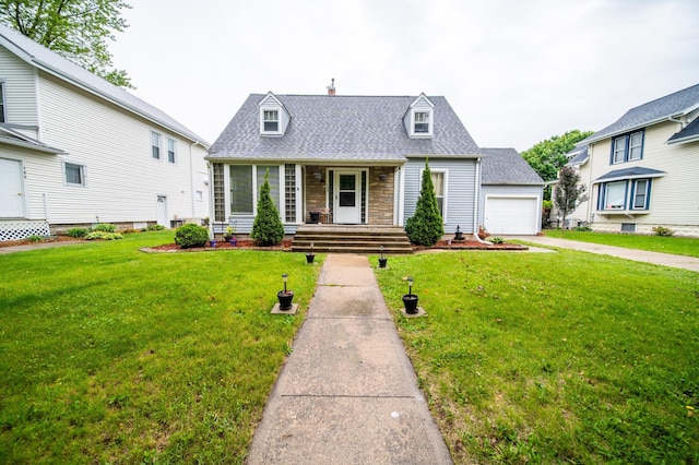 109 2nd St SW, Blooming Prairie, MN 55917 - cape cod home with covered porch, a garage, a front yard, and roof with shingles