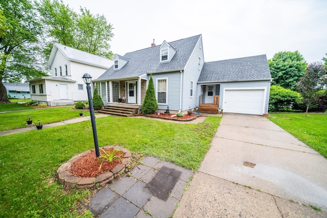 109 2nd St SW, Blooming Prairie, MN 55917 - new england style home with roof with shingles, an attached garage, a front lawn, concrete driveway, and a chimney