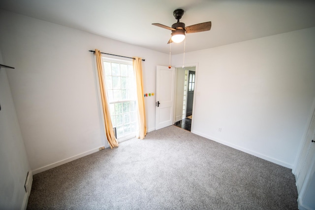 109 2nd St SW, Blooming Prairie, MN 55917 - unfurnished room featuring ceiling fan, carpet floors, and baseboards