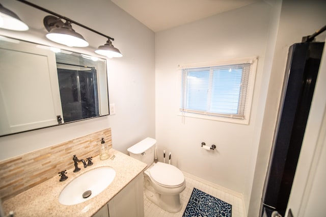 109 2nd St SW, Blooming Prairie, MN 55917 - bathroom featuring tile patterned flooring, toilet, vanity, curtained shower, and backsplash