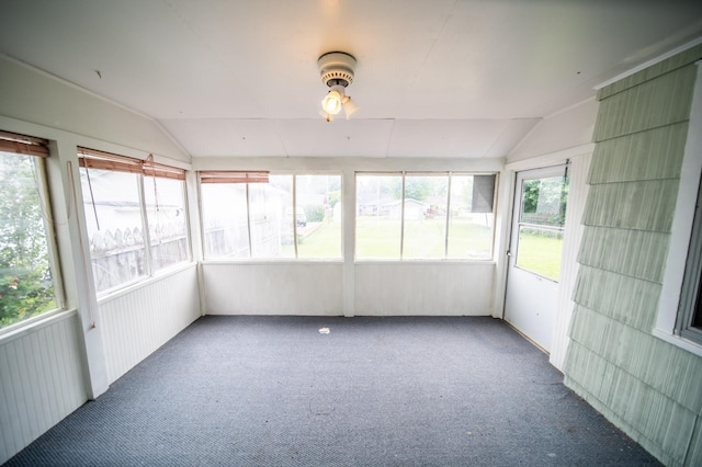 109 2nd St SW, Blooming Prairie, MN 55917 - unfurnished sunroom with lofted ceiling, carpet, ceiling fan, and radiator