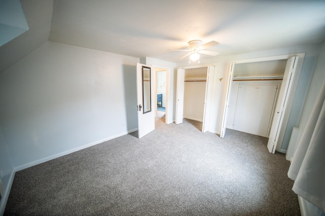109 2nd St SW, Blooming Prairie, MN 55917 - unfurnished bedroom with two closets, carpet, and ceiling fan