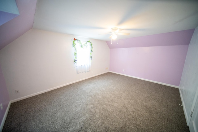 109 2nd St SW, Blooming Prairie, MN 55917 - bonus room with vaulted ceiling, ceiling fan, dark colored carpet, and baseboards