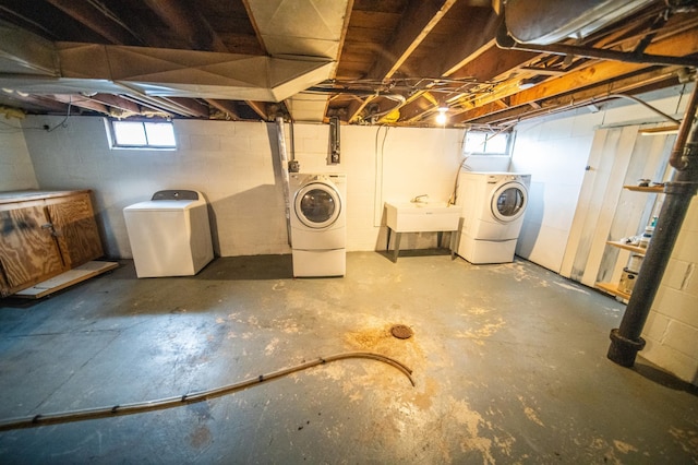 109 2nd St SW, Blooming Prairie, MN 55917 - below grade area featuring washer and dryer and a sink