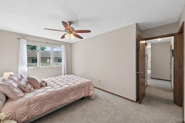 7618 Borman Way, Inver Grove Heights, MN 55076 - bedroom featuring light carpet, a textured ceiling, and a ceiling fan