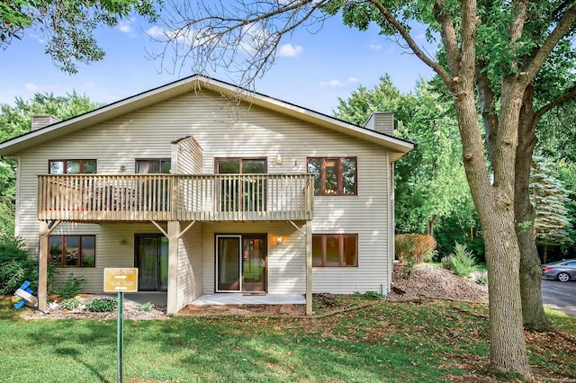 7618 Borman Way, Inver Grove Heights, MN 55076 - rear view of property with a chimney, a yard, and a patio area