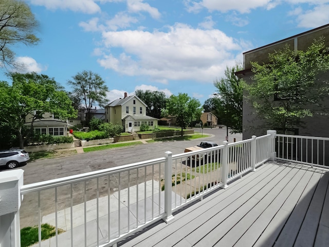 729 Burr St N, Saint Paul, MN 55130 - wooden deck with a residential view