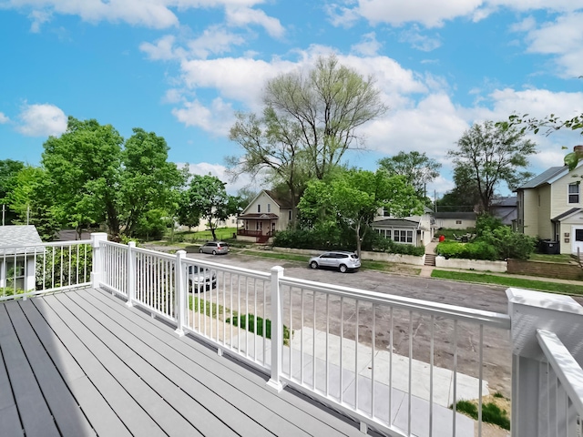 729 Burr St N, Saint Paul, MN 55130 - wooden deck with a residential view