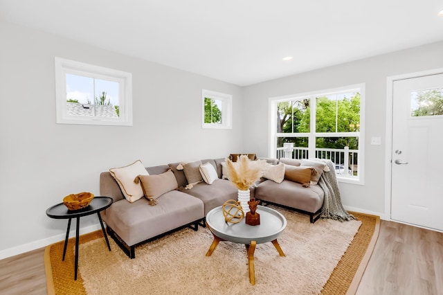729 Burr St N, Saint Paul, MN 55130 - living room with plenty of natural light, light wood-type flooring, baseboards, and recessed lighting