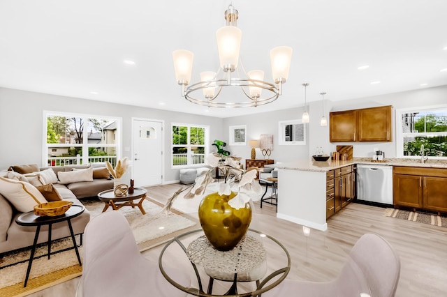 729 Burr St N, Saint Paul, MN 55130 - living area with light wood finished floors, healthy amount of natural light, a chandelier, and recessed lighting