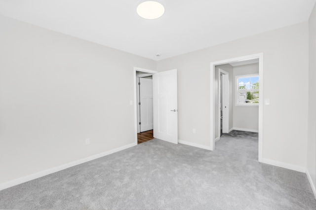 729 Burr St N, Saint Paul, MN 55130 - unfurnished bedroom with carpet floors and baseboards