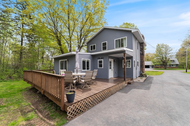 331 Locust St, Duluth, MN 55811 - back of property featuring a deck and outdoor dining area