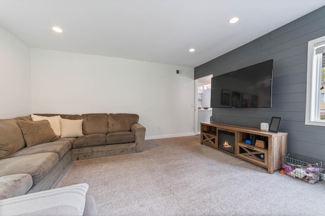 331 Locust St, Duluth, MN 55811 - carpeted living area with recessed lighting, wooden walls, and baseboards