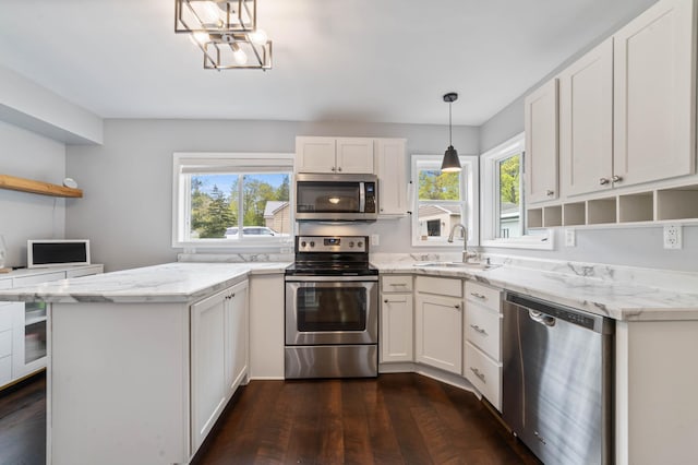 331 Locust St, Duluth, MN 55811 - kitchen featuring appliances with stainless steel finishes, open shelves, a sink, and white cabinets