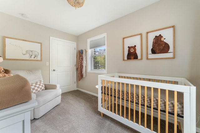 331 Locust St, Duluth, MN 55811 - bedroom with carpet, baseboards, and a crib