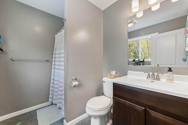 331 Locust St, Duluth, MN 55811 - full bathroom with vanity, toilet, baseboards, and curtained shower
