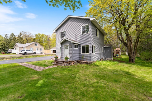 331 Locust St, Duluth, MN 55811 - view of front of home with a front yard
