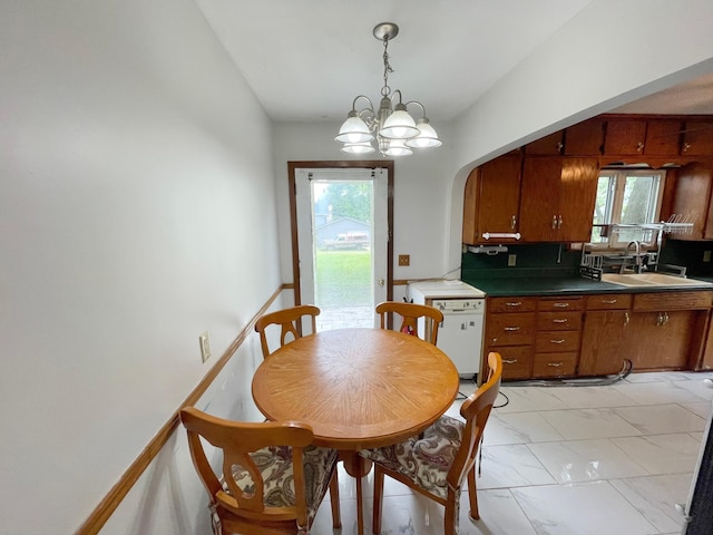 111 Park Ave, Springfield, MN 56087 - dining area featuring healthy amount of natural light, arched walkways, and light marble finish floors