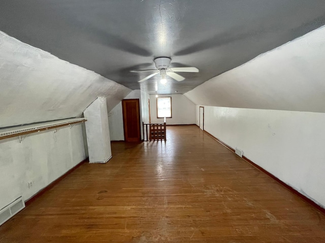 111 Park Ave, Springfield, MN 56087 - bonus room with a ceiling fan, wood finished floors, vaulted ceiling, and baseboards