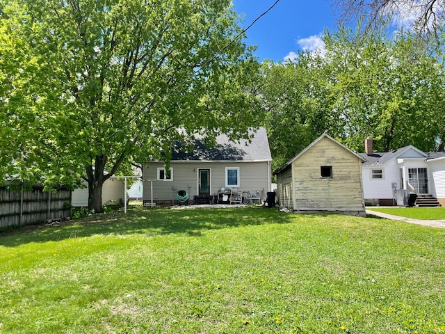 111 Park Ave, Springfield, MN 56087 - back of house featuring entry steps and an outdoor structure