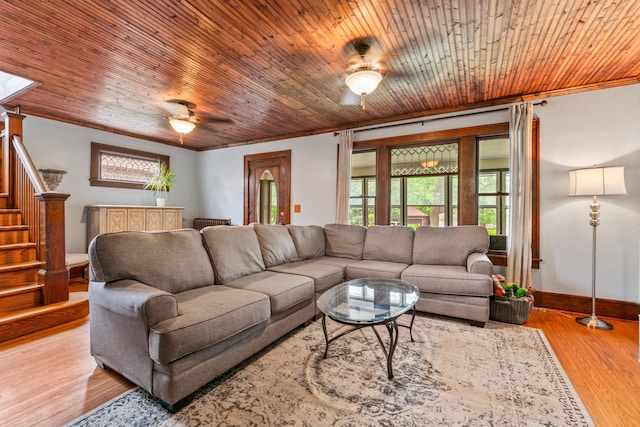 842 2nd St NW, Rochester, MN 55901 - living room featuring a ceiling fan, ornamental molding, stairway, baseboards, and wood finished floors