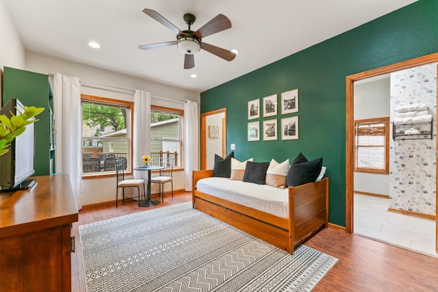 842 2nd St NW, Rochester, MN 55901 - bedroom with baseboards, wood finished floors, recessed lighting, and ceiling fan