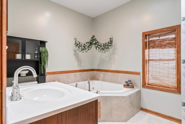 842 2nd St NW, Rochester, MN 55901 - bathroom featuring a tub with jets and a sink
