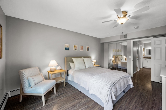 7510 Cahill Rd Unit 217B, Edina, MN 55439 - bedroom featuring dark wood finished floors, a ceiling fan, baseboards, and baseboard heating