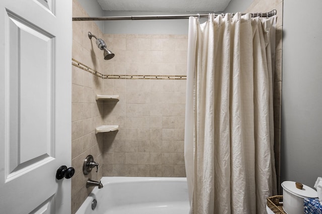 7510 Cahill Rd Unit 217B, Edina, MN 55439 - full bathroom featuring shower / tub combo with curtain and toilet