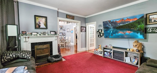 2753 Maple Ave, Slayton, MN 56172 - living area featuring ornamental molding, a fireplace with flush hearth, and wood finished floors