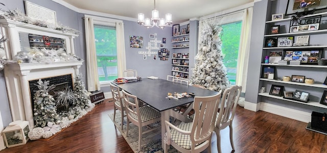 2753 Maple Ave, Slayton, MN 56172 - dining area with a chandelier, wood finished floors, baseboards, a high end fireplace, and ornamental molding