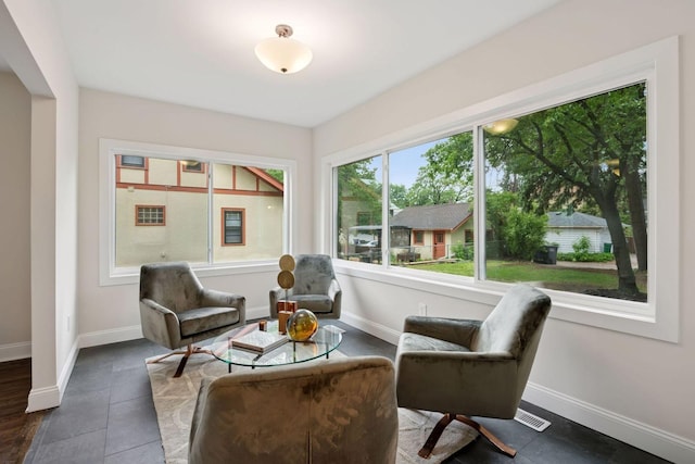 4816 3rd Ave S, Minneapolis, MN 55419 - living area featuring baseboards and dark tile patterned floors