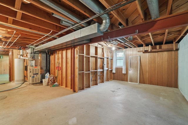11748 Bittersweet St NW, Coon Rapids, MN 55433 - basement featuring gas water heater, heating unit, and wood walls