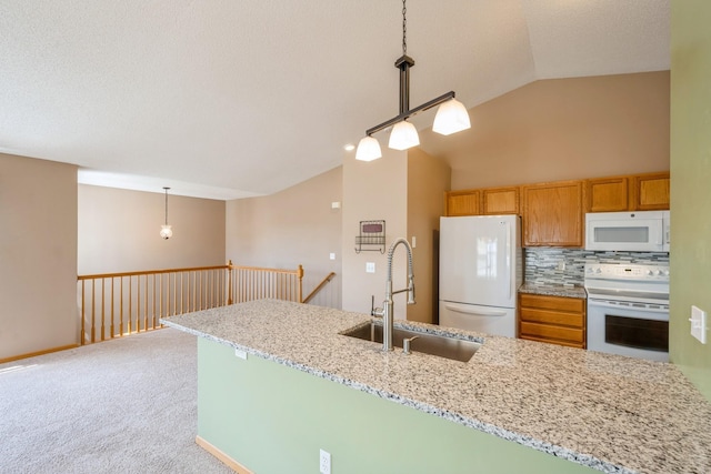 1005 Providence Dr, Shakopee, MN 55379 - kitchen with white appliances, vaulted ceiling, a sink, tasteful backsplash, and hanging light fixtures