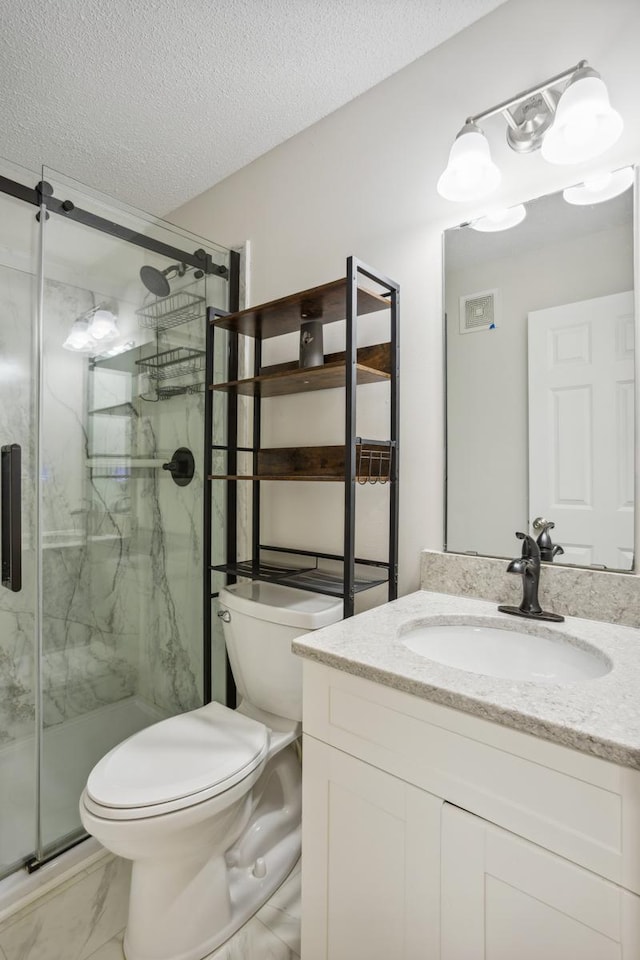 16480 Elm Creek Ln, Lakeville, MN 55044 - full bathroom featuring vanity, a marble finish shower, marble finish floors, and a textured ceiling