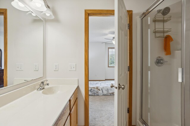 16480 Elm Creek Ln, Lakeville, MN 55044 - ensuite bathroom with a shower stall, vanity, and ceiling fan