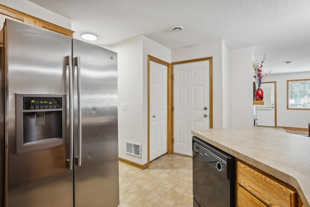 16480 Elm Creek Ln, Lakeville, MN 55044 - kitchen featuring stainless steel fridge with ice dispenser, black dishwasher, a textured ceiling, light countertops, and light flooring