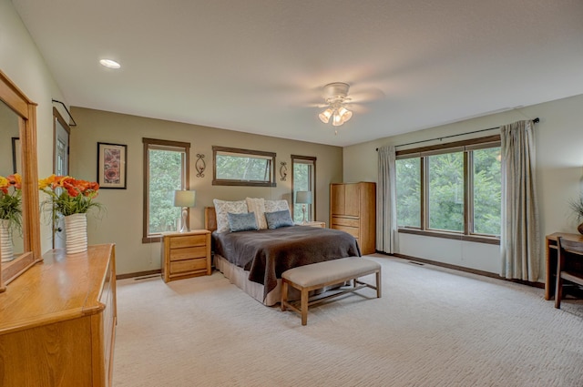 1167 56th St, Hudson, WI 54016 - bedroom featuring light carpet, recessed lighting, and ceiling fan