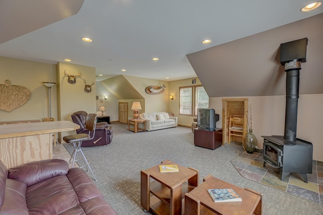 1167 56th St, Hudson, WI 54016 - living room with carpet flooring, recessed lighting, and a wood stove